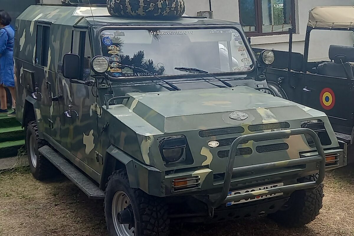 Armored defense vehicle for rugged ground applications
